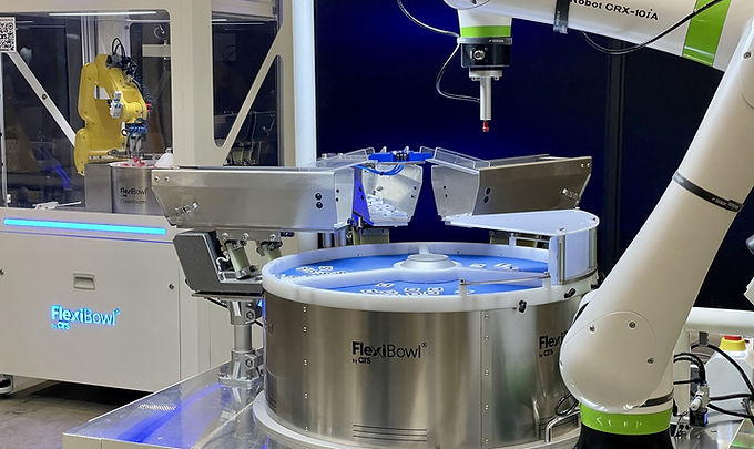 FANUC CRX cobot picking parts from a FlexiBowl flexible feeder with a sectored disc, supplied and supported by M6 Revolutions in the Northwest and British Columbia