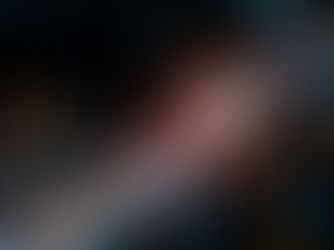 Abstract AI brain icon at center with glowing blue and orange circuit lines radiating on a dark background