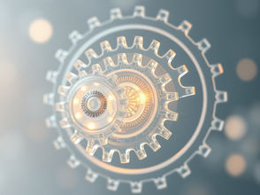 Glowing transparent gears interlock on a soft blue blurred background, creating a sleek futuristic machinery scene.