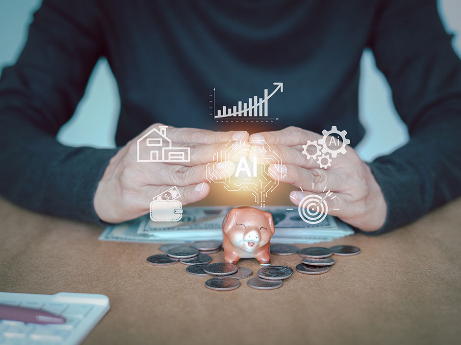 Hands over a piggy bank surrounded by coins on a table. Digital icons like AI, graphs, and a house imply technology and finance themes.