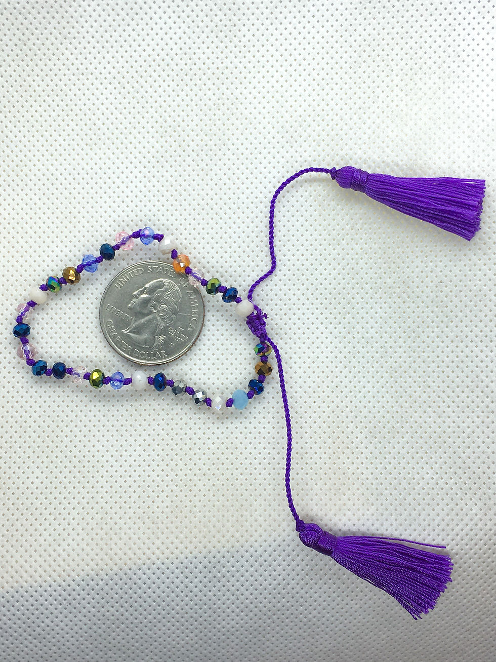 Thumbnail: Adjustable tassel  bracelet purple