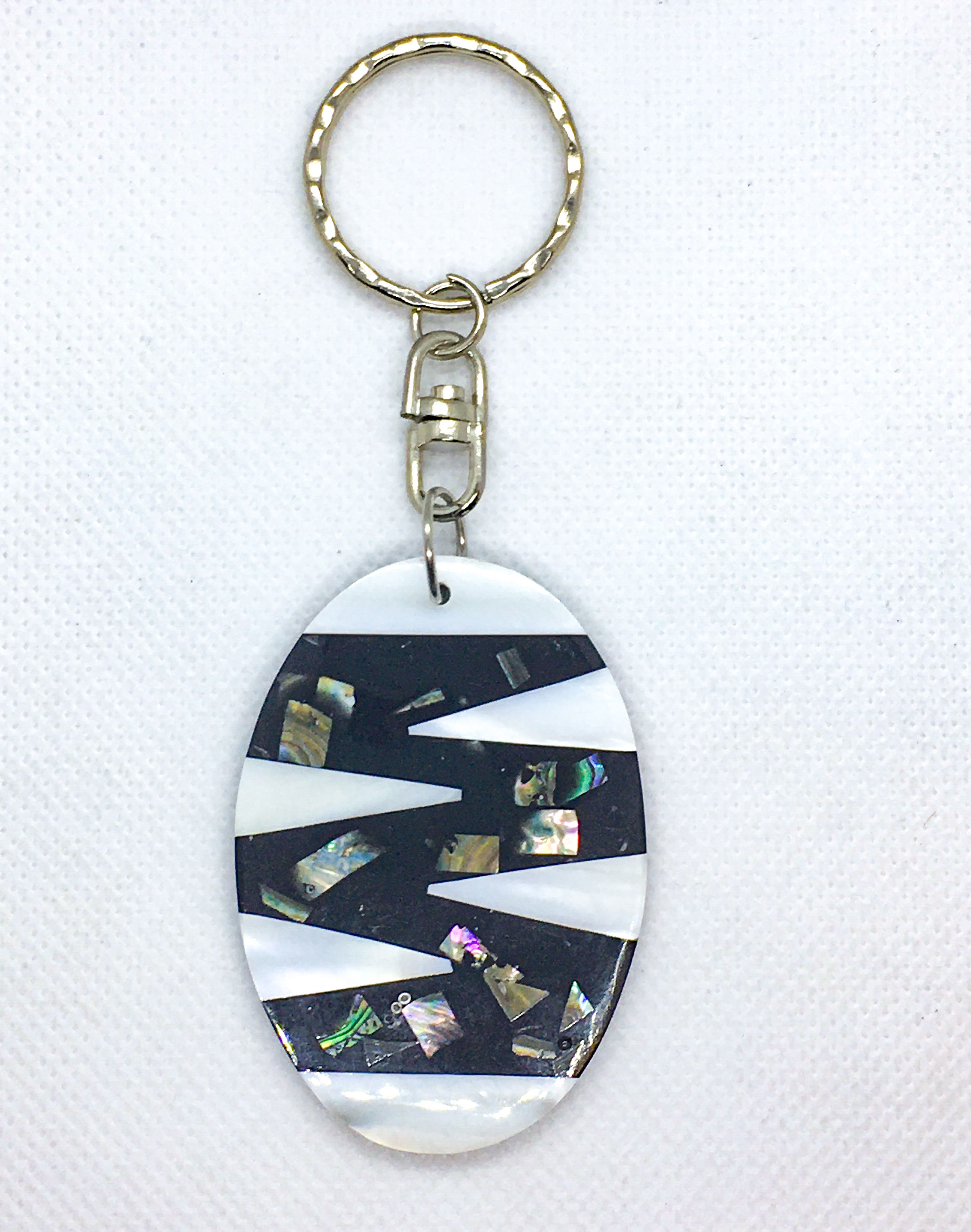 White zigzag oval shell keychain