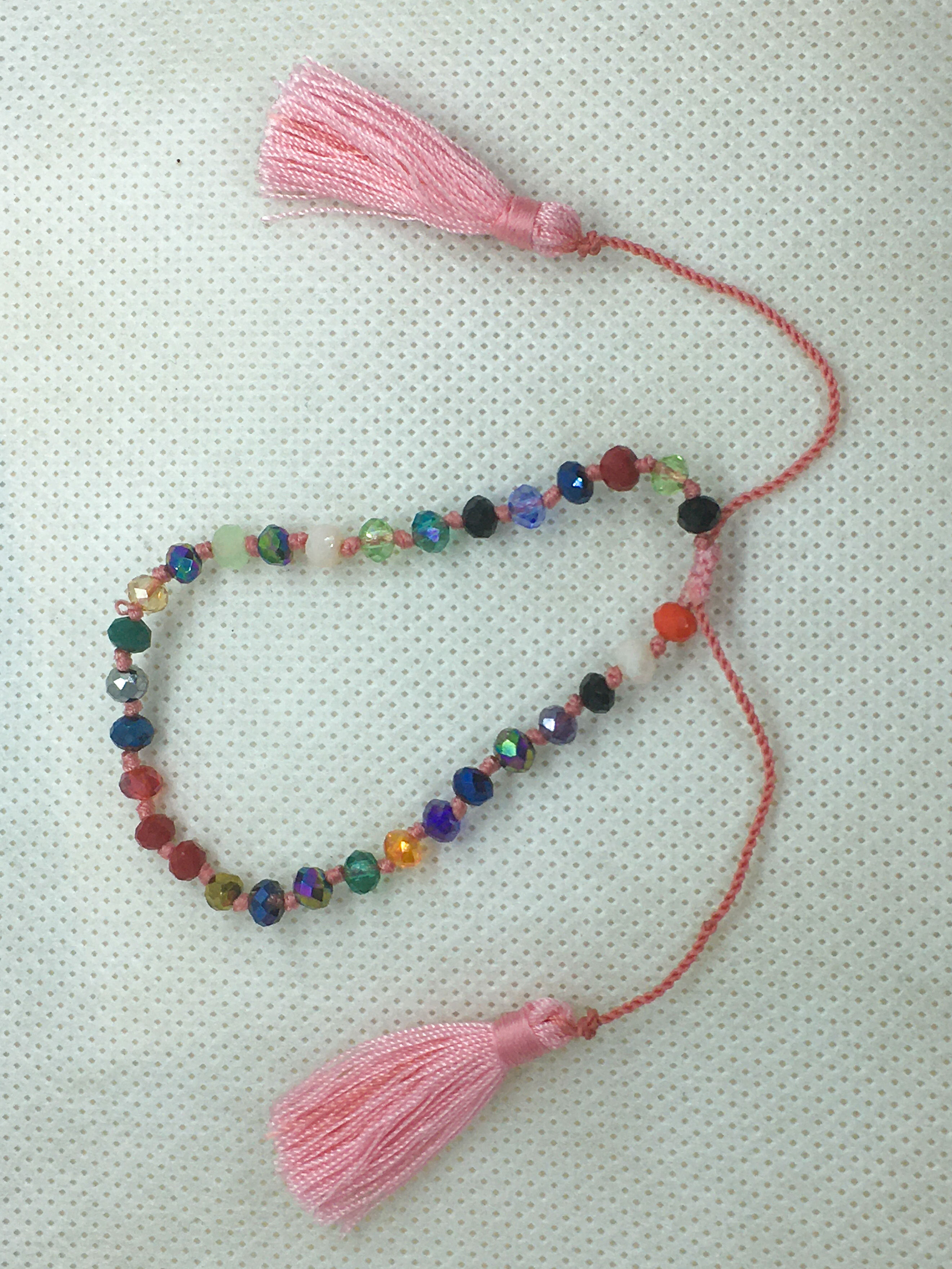Adjustable tassel bracelet pink