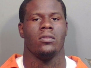Thompson to serve 25 years for gun convictions