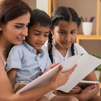 A mother reading together with kid