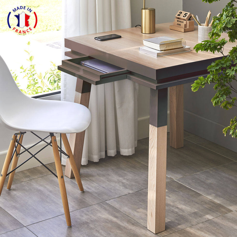 chcolate brown design square desk with an opened drawer and a chair in front of a window