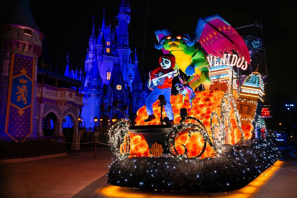 Festive parade float with vibrant colors, featuring a skeleton character playing guitar, colorful creature, lights, and castle backdrop at night.