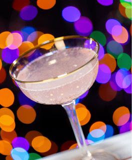 pink martini in a rounded glass