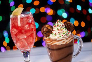 a chocolate mousse with whipped cream and cookies in a mickey shape