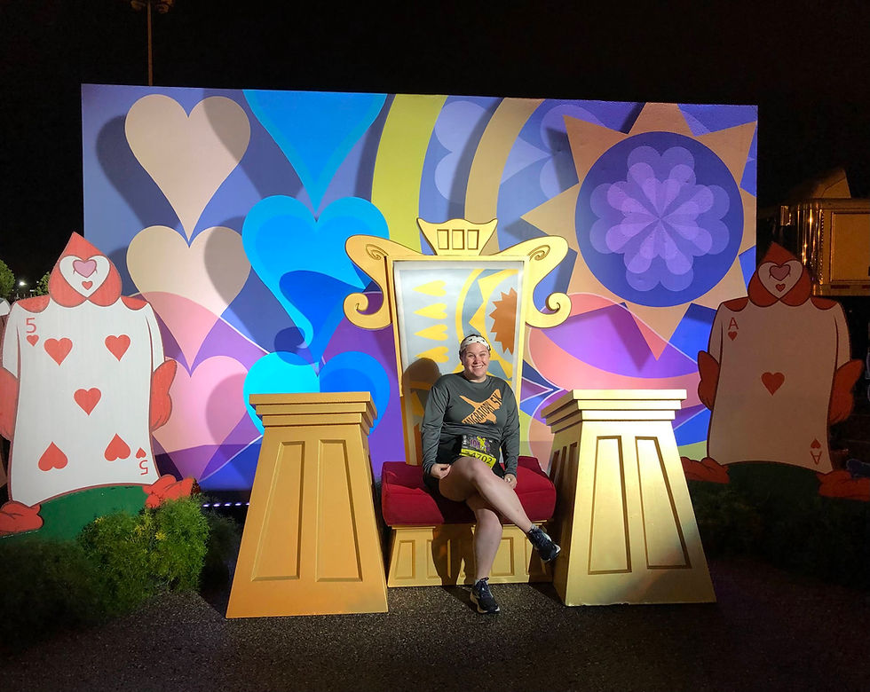 Prerace Photo Ops with an Alice In Wonderland themed backdrop.