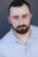 Headshot white shirt.jpg