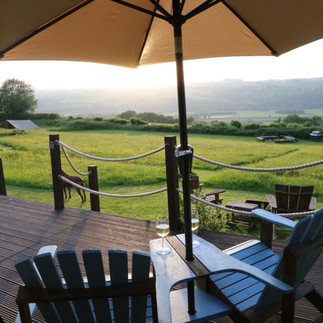 Glass of wine looking over the valley