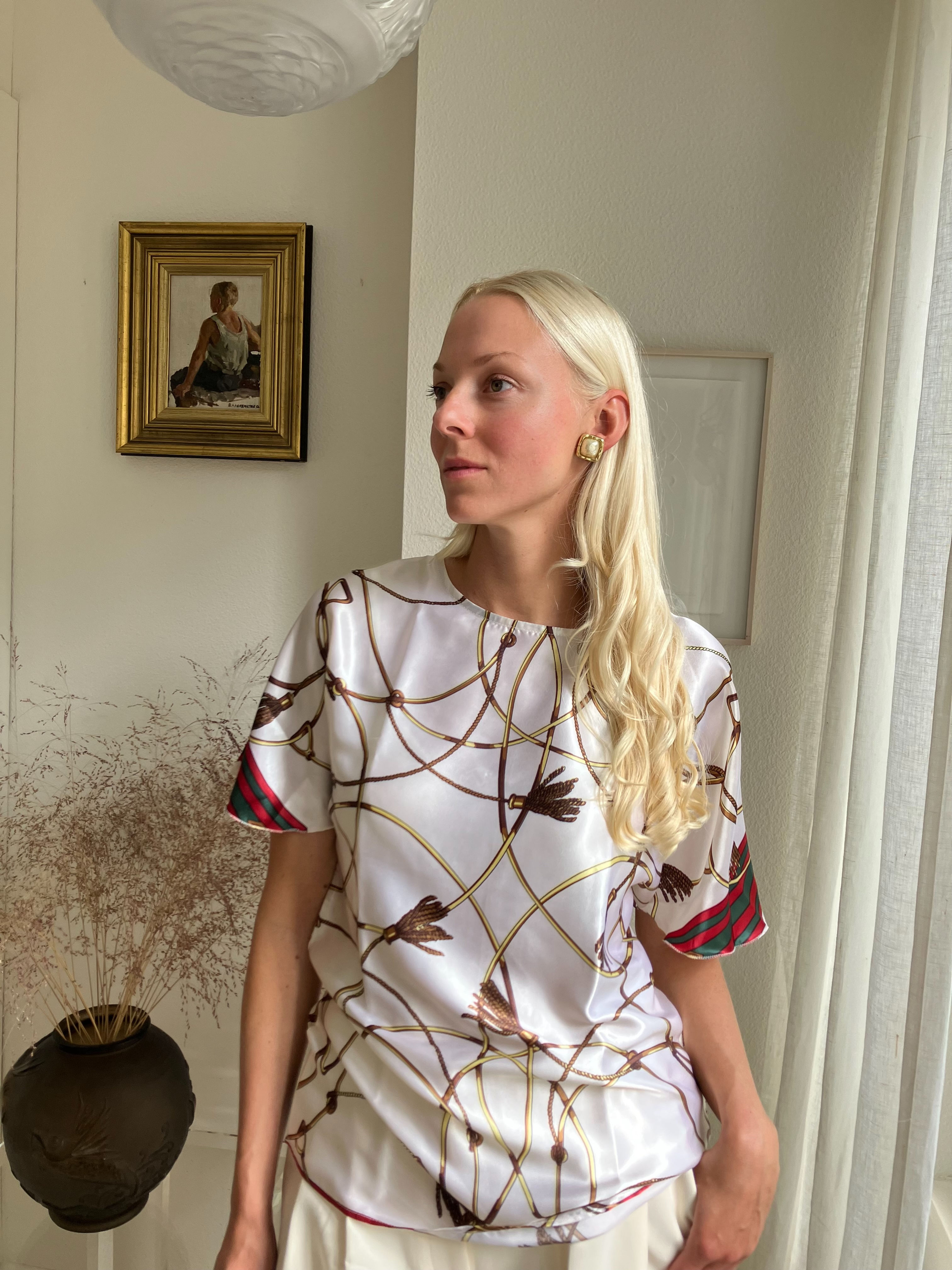 Silk blouse with ornament and sleeves