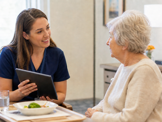 Registered Dietitian consulting with a resident in a skilled nursing facility on nutrition care planning