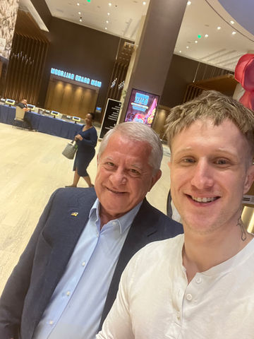 Austin Ambrozi and the former Prime Minister of Ukraine, Anatoliy Kinakh at the Ukraine Reconstruction Summit hosted at the MGM Grand Harbor in Washington, D.C. Austin helped organize the event and built some of the digital infrastructure powering the event.