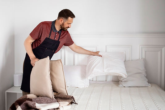 man-servant-making-bed.jpg