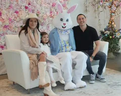Family with Easter Bunny at a floral event