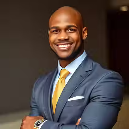 Strong muscular bald African-American young man wearing a well fitted suit and a handsome