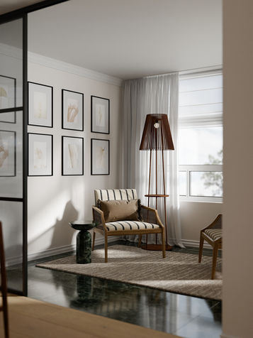 Living room gallery wall with framed art and wooden furniture in Don Mills Toronto apartment.