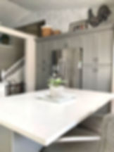 Modern Farmhouse Kitchen Makeover | Repainted Cabinets and Brick Wallpaper