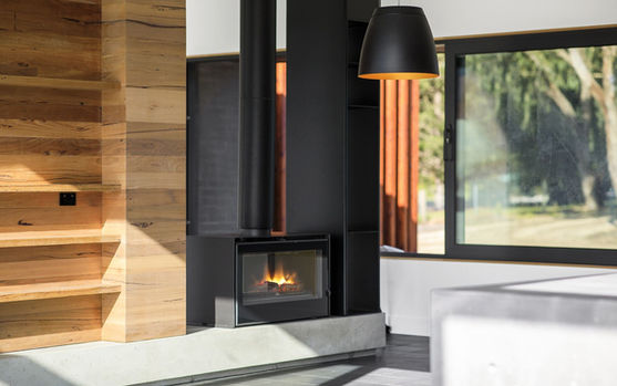 Double side concrete fireplace - Torquay