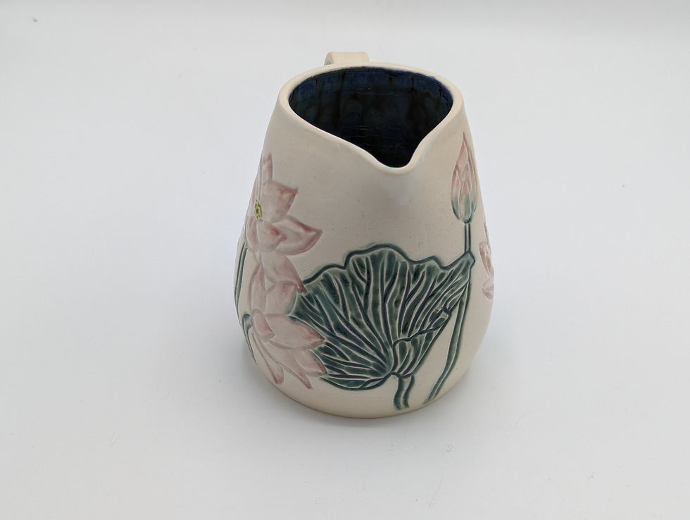 Thumbnail: Hand Thrown Pottery, Glazed and Carved Lotus Flower Jug