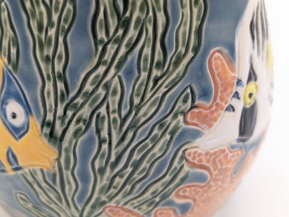 Thumbnail: Hand Thrown Pottery, Glazed and Carved Tropical reef fish vase