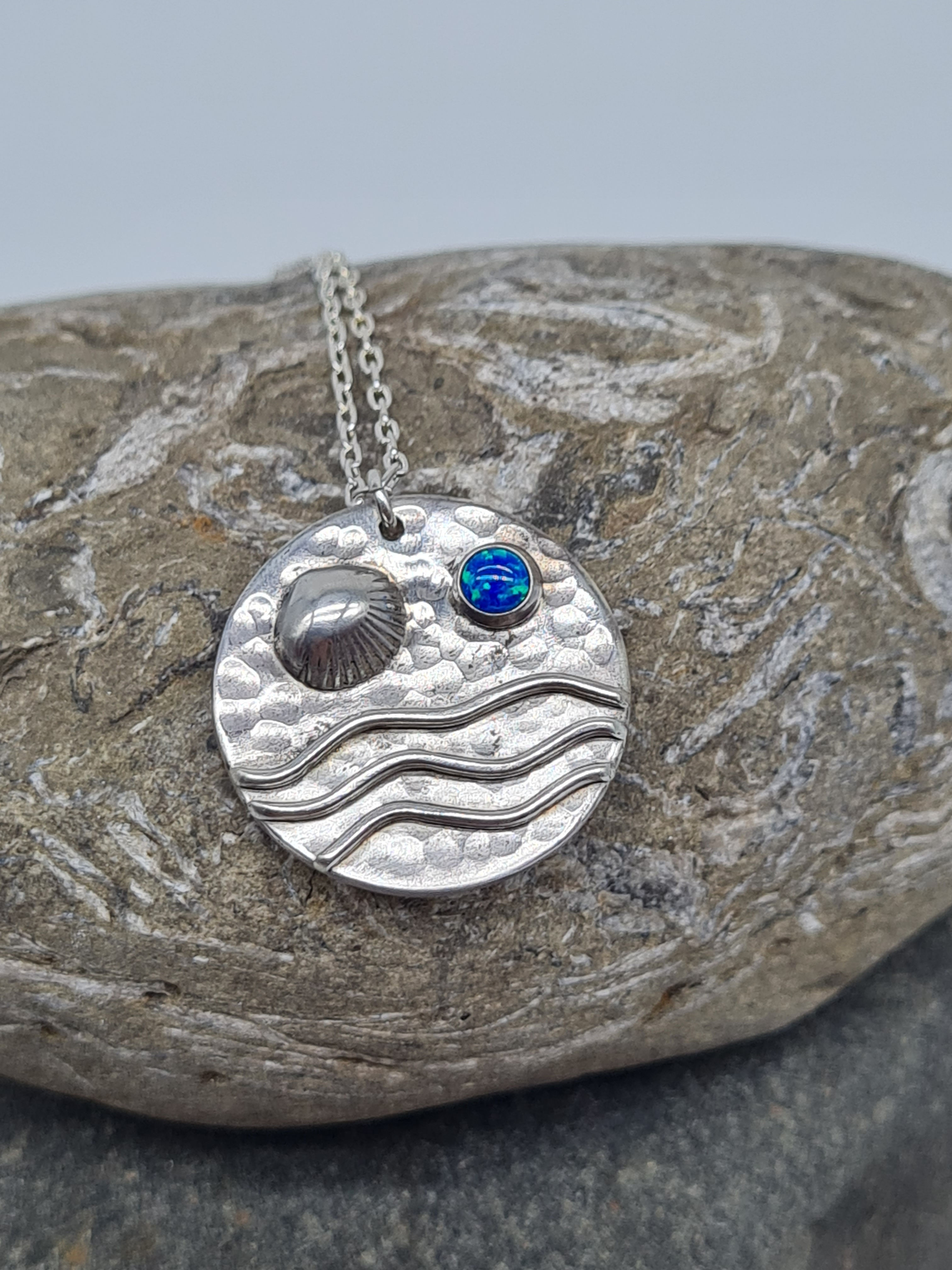 Sterling silver wave and sea shell pendant