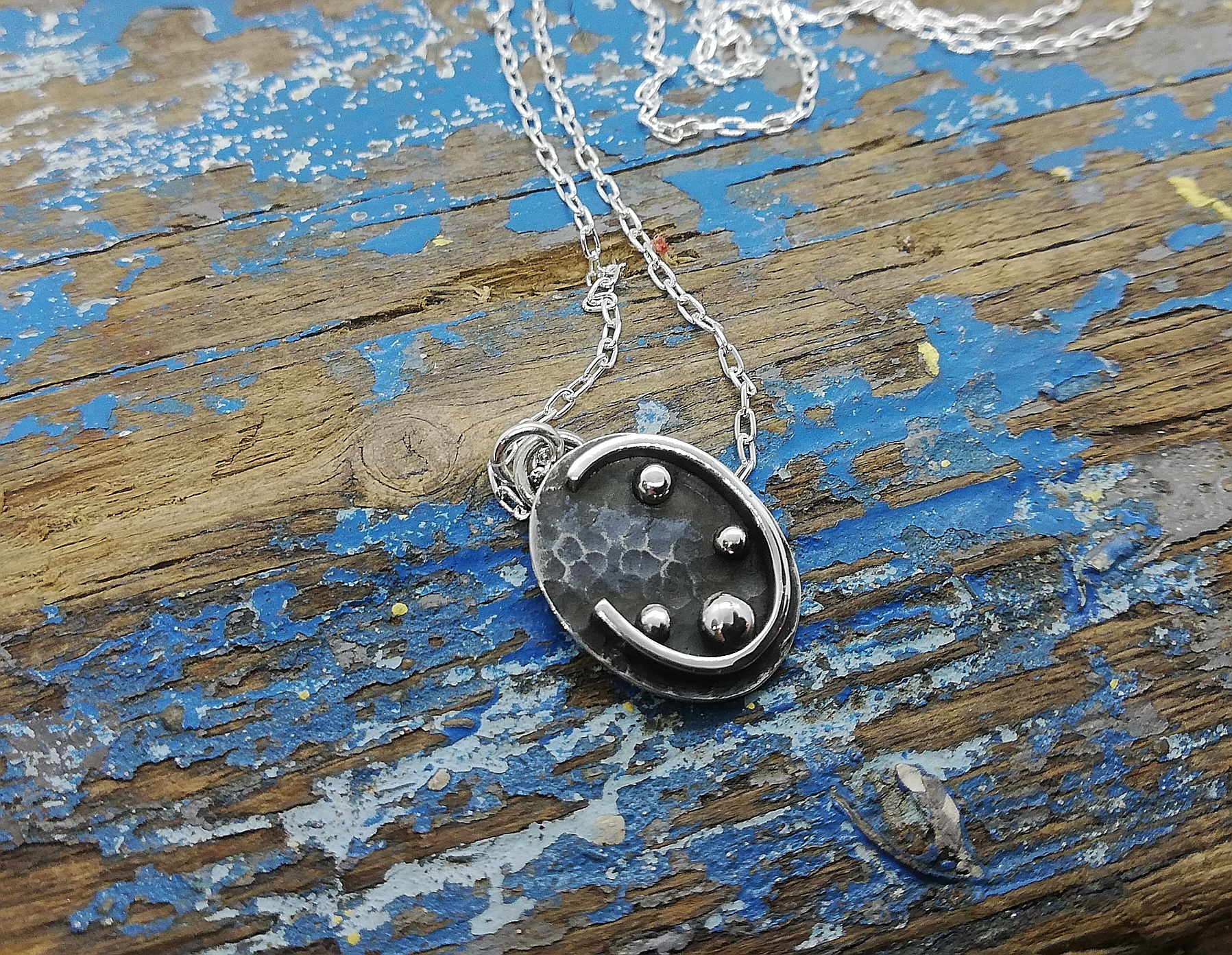 Rocks and wave pendant 