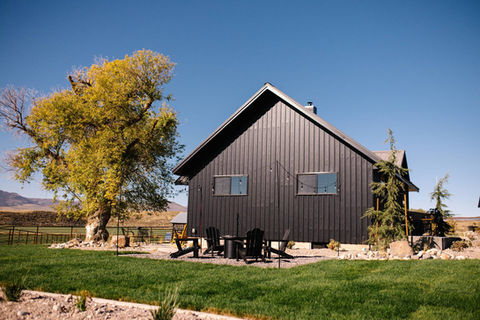 Back view of Air BnB house with outdoor seating