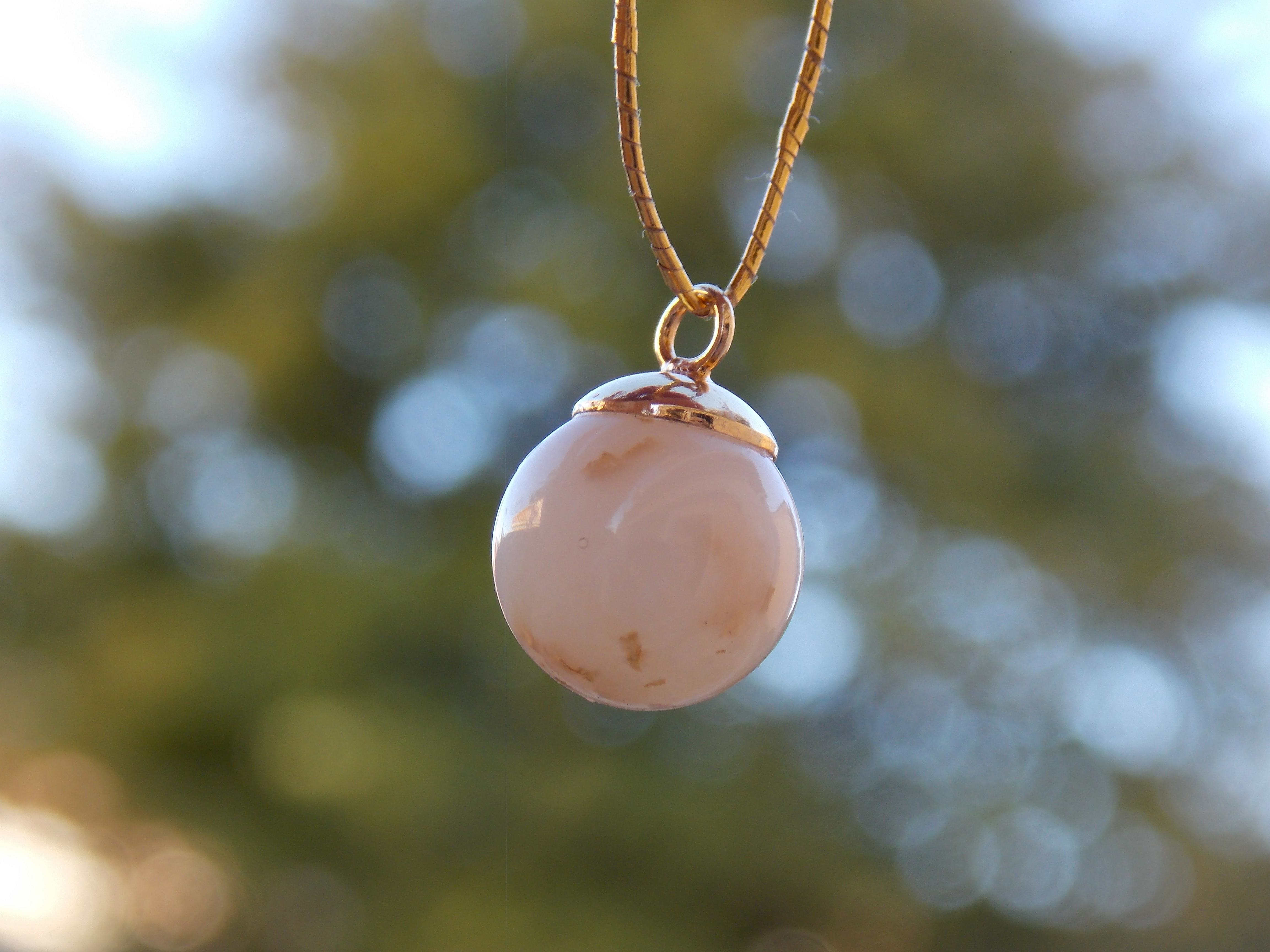 "Liquid Gold" Pearl Pendant $80