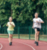 child-fitness-teenager-girls-running-stadium-track_169016-43140_edited.jpg