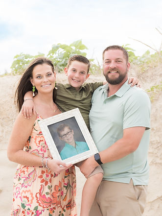 holding Cohen on the dunes.jpg