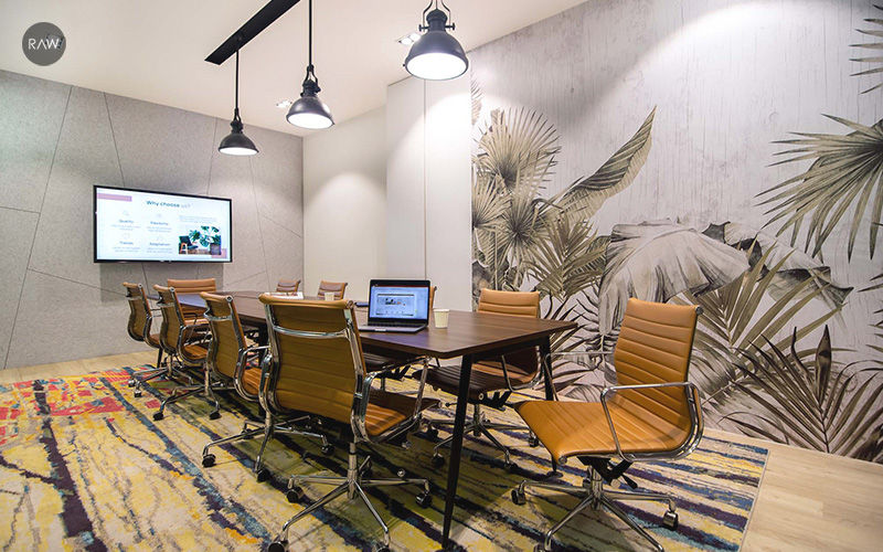 A Conference Room with Biophilic Wallpaper Design by Raw Design