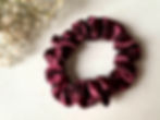 Pure mulberry silk scrunchie in elegant burgundy, perfect for a gentle, damage-free hair hold