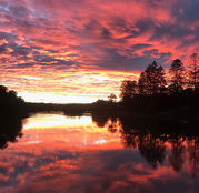 OUT OF THE SUNSET'S RED