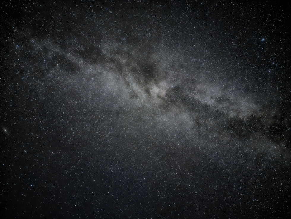This picture was taken with a cellphone over Georgian Bay, Canada - it is possible to take decent photos of the Milky Way with a cellphone camera. Many cameras have a "night sight" or "astrophotography" setting. This setting opens the camera shutter for up to four minutes, taking a series of photos which are then processed and stacked in the camera before producing a final image. Incredibly, the phone's camera accounts for the rotation of the Earth's rotation to eliminate star trails. Use a tripod to assist with sharpness, set the focus to "infinity" or "far", and shoot in the darkest place possible: even far away house or car lights can cause flares that ruin the image. Set the camera’s shooting mode to both JPEG and RAW. RAW files capture much more information than JPEGs and can be edited using online editing software – this can bring out detail that is not visible in JPEG.