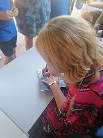 Lucy Signing.jpeg