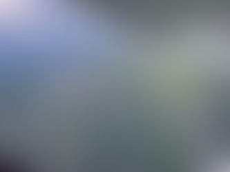 A view of Guatemala from the air with the wring of an airplane in view