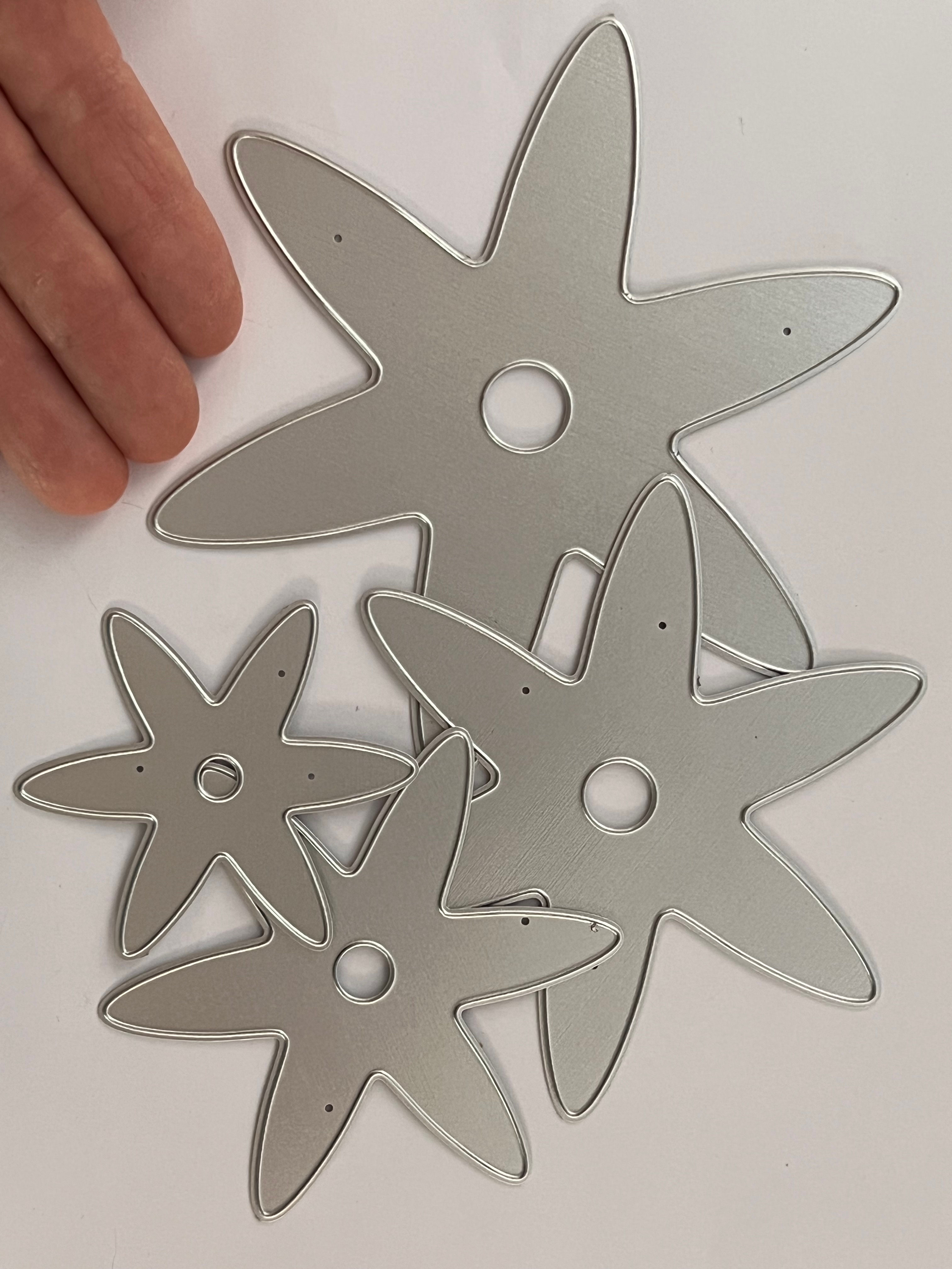 4 tiered layering thin metal die cut star shapes