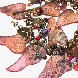 Shrinkets shrink plastic jewelry.