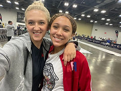 Coach Oksana and Avery all smiles before the competition