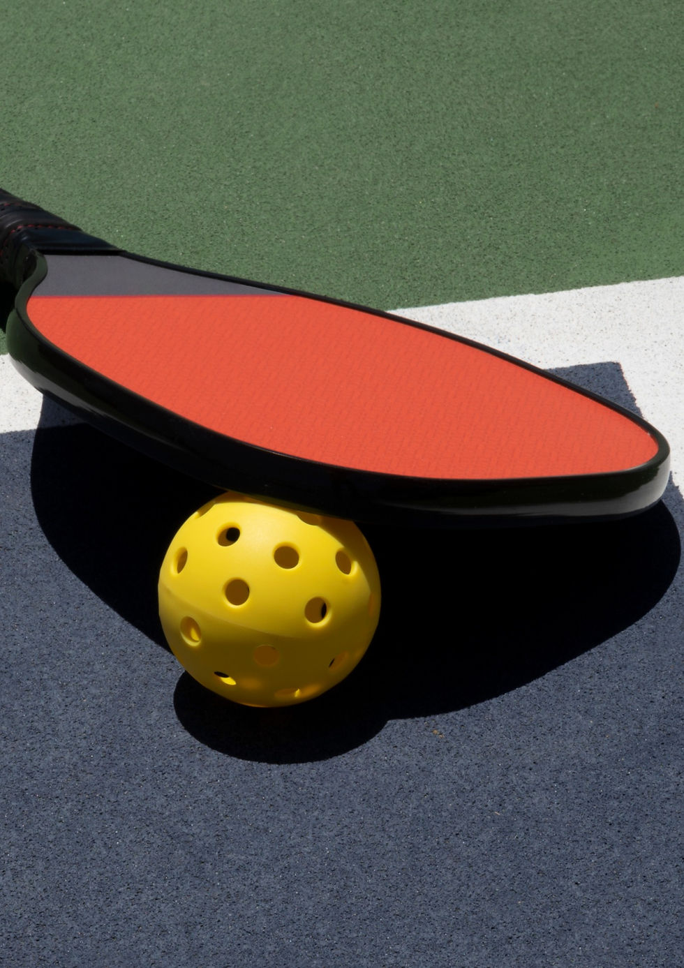 Pickleball Time Out with Ball and Paddle on Court_edited.jpg