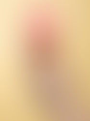 Female hand model holding ice cream cone with pink ring on index finger