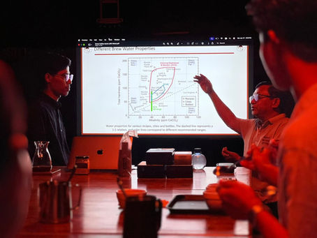 Behind The Passion instructors discussing brew water properties during their January 2026 workshop in Myanmar.