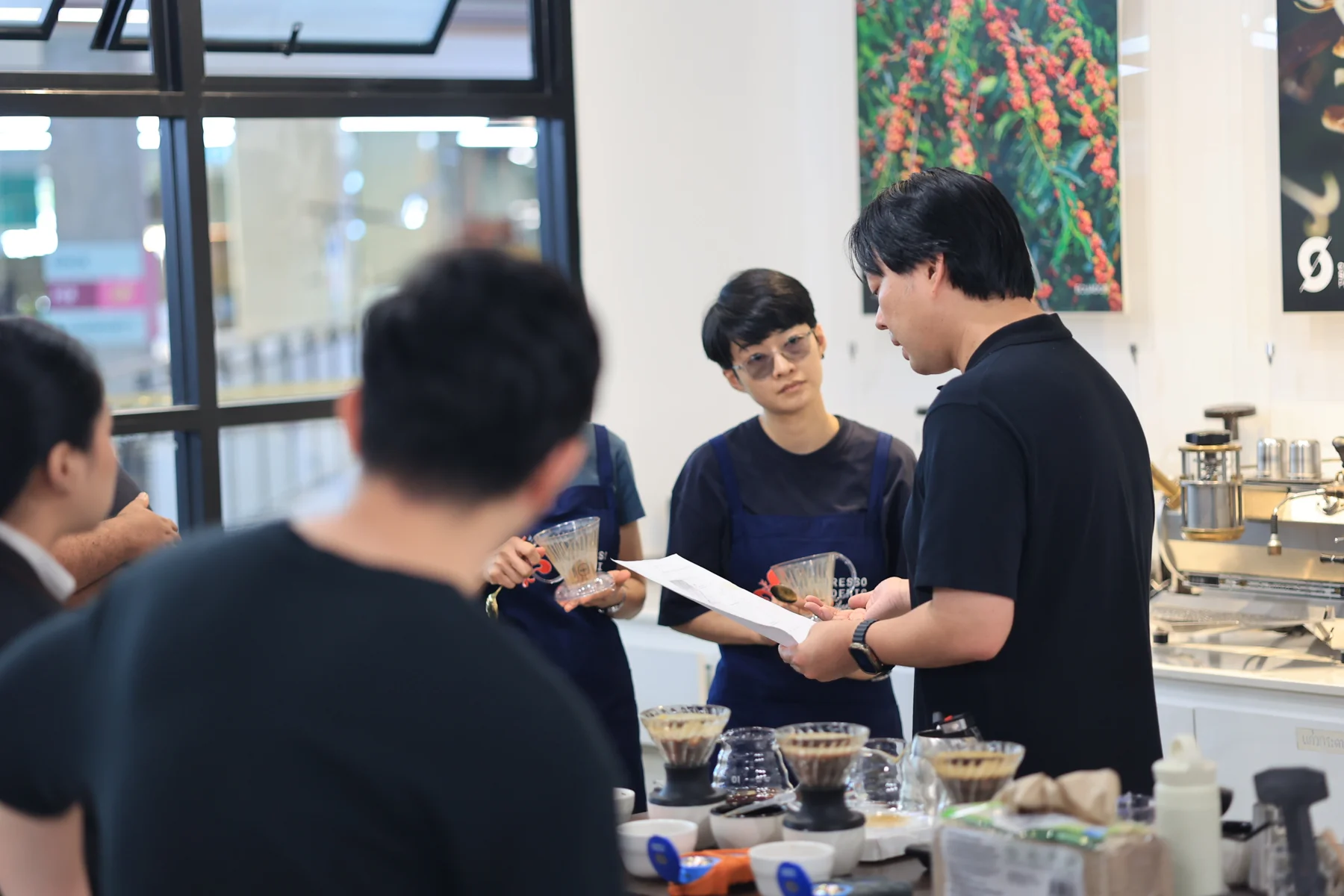 Natt and students discussing brewing in the classroom