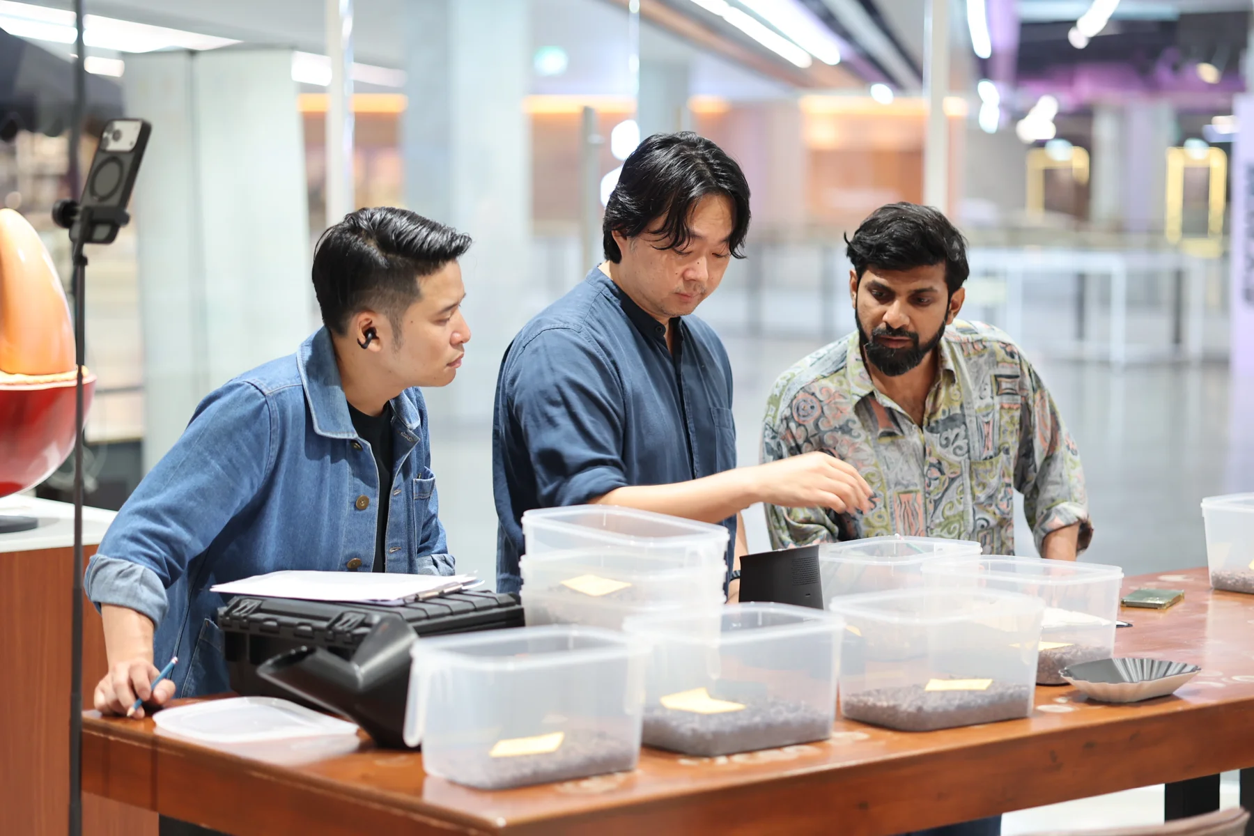Natt and students comparing coffee roasting results