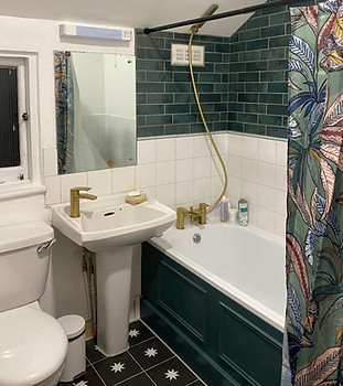 Restored bathroom with green tiles clapham junction SW11
