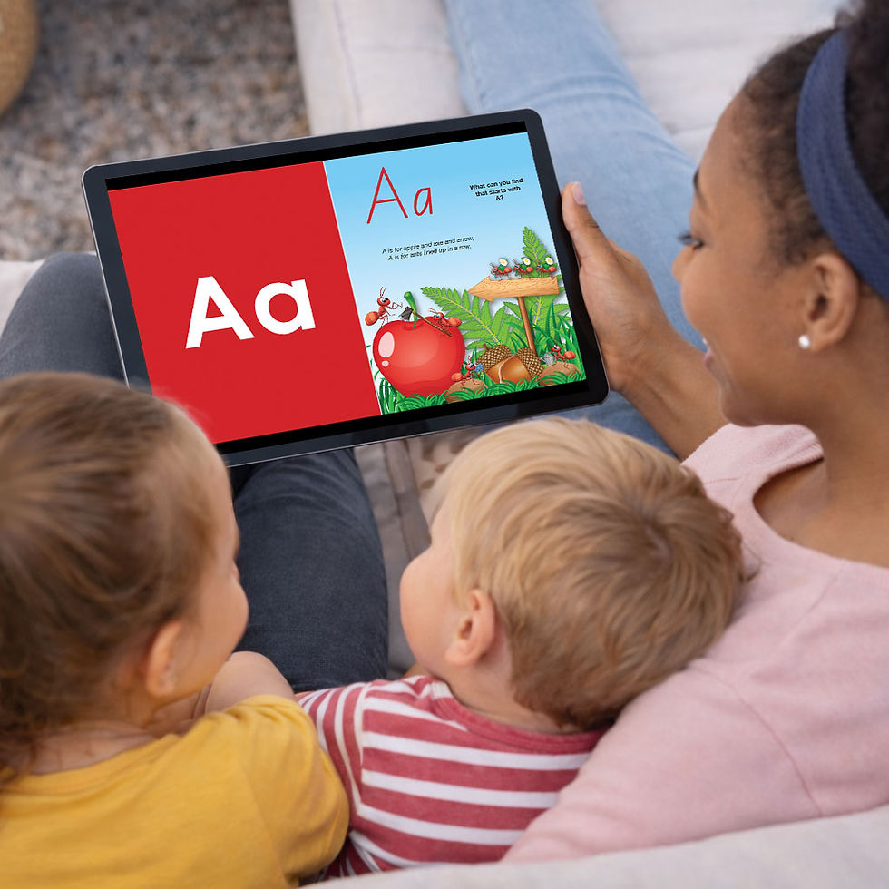 Children sitting with a parent reading an alphabet ebook on a tablet during shared learning time.