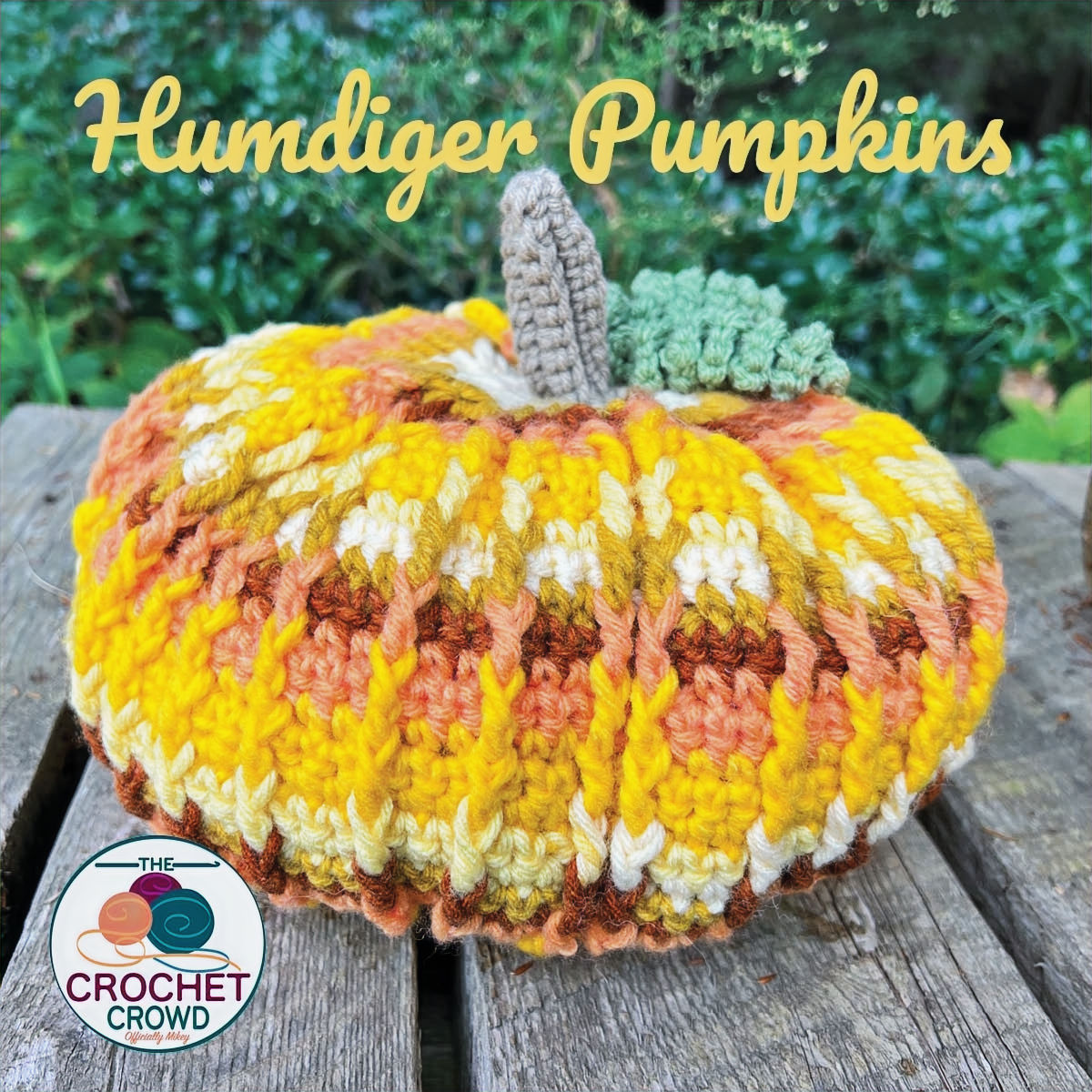 Crochet Pumpkin Sitting On Bench